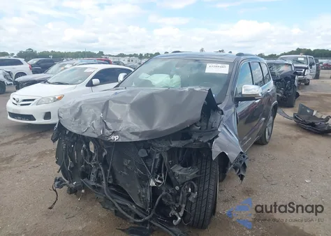 2014 Jeep Grand Cherokee Overland z USA, uszkodzony, nr VIN 1C4RJFCG6EC211600